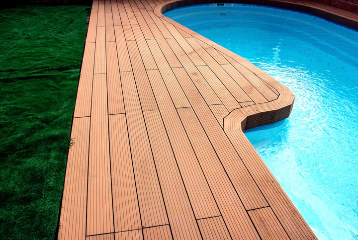 brown composite decking around swimming pool
